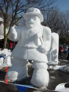 thumbnail of Cartoon Firefighter snow sculpture