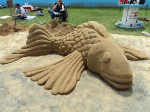 thumbnail of Fish sand sculpture