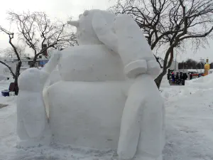 thumbnail of Penguins Building a Snowman snow sculpture